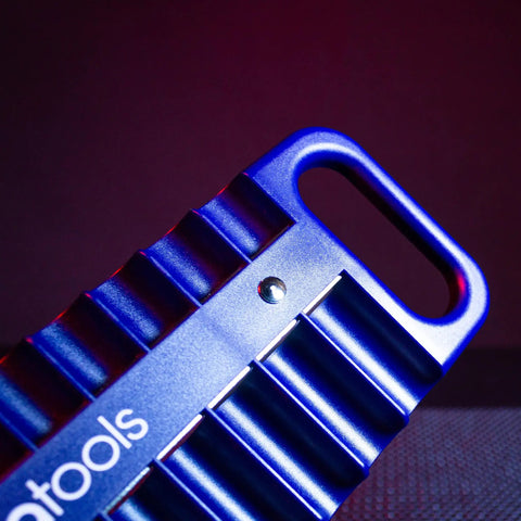 Close-up of blue Magnetic Grab And Go Portable Socket Organizer Tray showing handle and slots for sockets