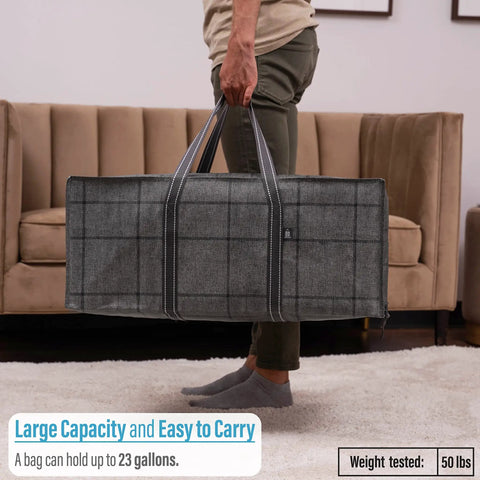 Person holding Eight Pack Moving Bags And Storage Totes With Lids, large black windowpane pattern, 23 gallon capacity