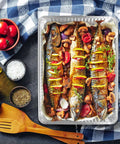 Disposable Aluminum Pans 5 Pack 13 By 17 Baking Sheets with baked fish and vegetables, showcasing even baking and easy cleanup