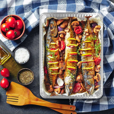 Disposable Aluminum Pans 5 Pack 13 By 17 Baking Sheets with baked fish and vegetables, showcasing even baking and easy cleanup