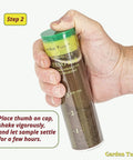 Hand holding DIY Soil Texture Test Kit with calibrated jar to measure soil layers and structure, step 2 of instructions visible.