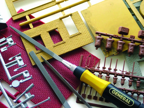 Swiss Pattern Needle File Set With Handle 12 Piece General Purpose File Kit for toolmakers and hobbyists on a workbench