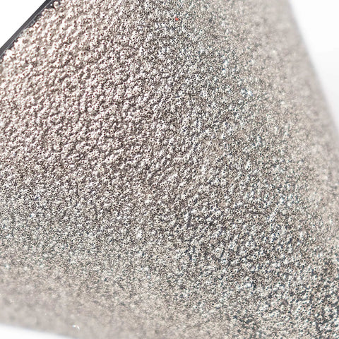 Close-up texture of Two Inch Diamond Beveling Chamfer Bits for Granite and Marble Tiles Pack of 2 with 5/8-11 Thread.