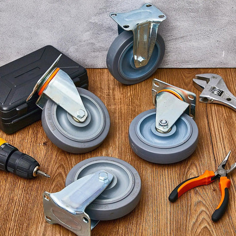 Five Inch Rubber Caster Wheels With Two Swivel And Two Rigid Rollers Non Marking Silent Drive Built Tough Heavy Duty Rigging For Smooth Cruising Upgrades And Top Shelf Reliability Daily on wooden surface with tools.