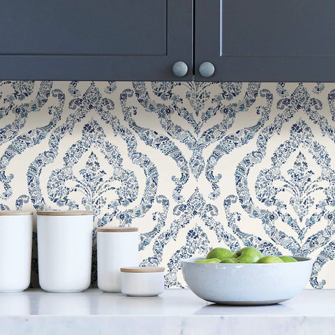 Guildford Peel And Stick Damask Wallpaper Blue, Easy Install shown on a kitchen wall, with a decorative blue damask pattern.