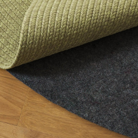 Dual Surface Rug Pad 6 Foot Round One Quarter Inch Thick Felt And Rubber No Slip Grip Padding For Hard Floors And Carpet Stays Put Reduces Noise And Adds Thermal Insulation Grey, showing felt and rubber layers