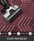 Vacuum cleaning an All Season Waterproof Front Door Mat With Drainage Holes For Indoor Outdoor Use Heavy Duty Non Slip Doormat 29.5 By 17 Inches Red.
