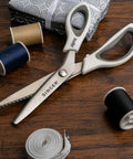 ProSeries 9 Inch Pinking Shears With No Fray Zigzag Edge Heavy Duty Stainless Steel Blades White Soft Grip Handle For Easy Pain-Free Fabric Cutting And Fray-Free Seams on fabric and thread