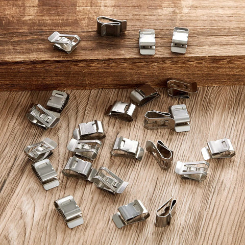 Heavy Duty Stainless Steel Solar Wire Clips For Outdoor Setup And Yard Work Fits 0.2 To 0.3 Inch Cable, 100 pack viewed on wood surface.