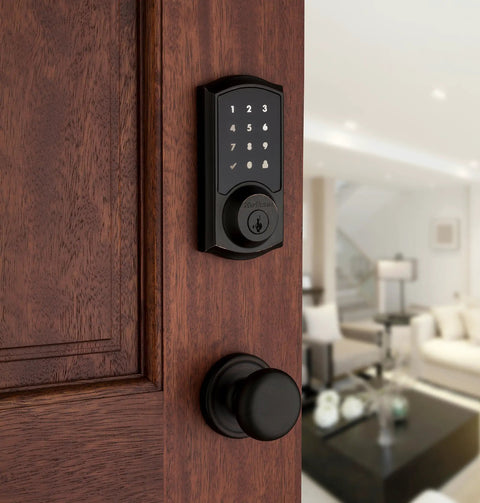 SmartCode 915 Touchscreen Electronic Deadbolt With Smart Key UL Listed Illuminated Keypad on wooden door