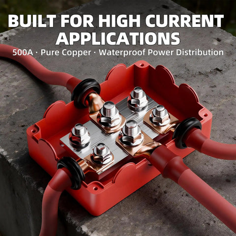 Heavy Duty Copper Bus Bar Power Distribution Block Set With Waterproof Covers For 12V 500A Systems on stone surface with wires.