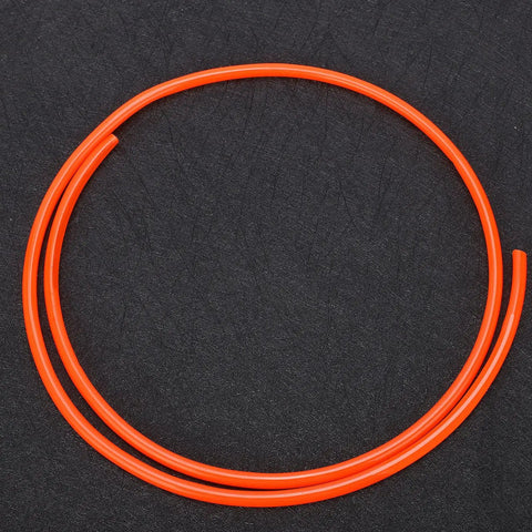 Heavy Duty TPU Air Hose Flexes Like A Champ Built Tough To Handle High Pressure Without Kinking Clear Resilient Tubing curled on a dark surface.