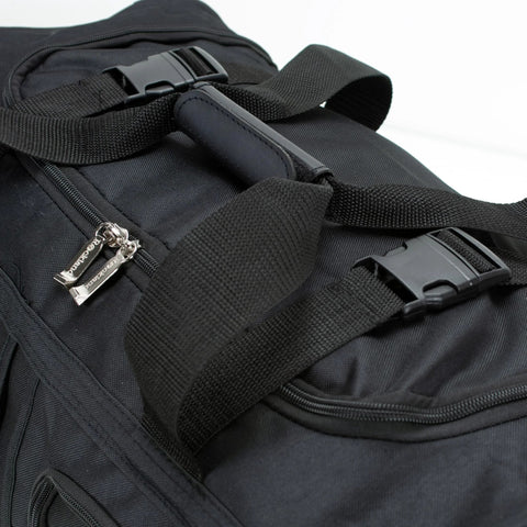 Rockland rolling duffel bag, black, 22-inch; close-up of top handle and buckle strap