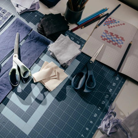 18 By 24 Inch Self Healing Cutting Mat For Sewing And Crafting, Dope Lilac Mountain Haze Color, Durable Grid Surface With Easy Read Measurements And 30 45 60 Degree Bias Lines For Precise Angle Cuts, Great For Quilting, Scrapbooking, Gift Wrapping on a sewing desk