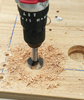 Eight Piece Heavy Duty Hex Shank Forstner Bit Set Built From Heat Treated Steel for smooth drilling visible in wood.
