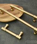 Champagne Bronze Cabinet Pulls 5 Inch Hole Centers Zinc Alloy Square Handles on wooden background, pack of 10