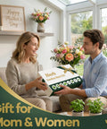 Woman receiving Indoor Herb Garden Starter Kit All In One Garden Set With 8 Biodegradable Pots Soil Discs And 8 Non GMO Seeds Basil Mint Oregano Dill Chives Parsley Sage Perfect Gift For Home Cooks And Green Thumbs Great For Beginners And Pros from man on sofa; backdrop of plants and gift box decor