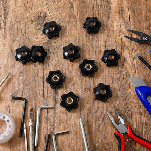 Top Shelf 10 Pack M8 Knurled Clamping Nuts With Slick Black Star Thumb Grips on a workspace with tools.