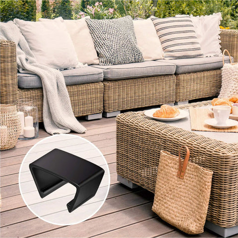 Durable Patio Furniture Clips To Keep Your Outdoor Sofa Locked Tight Without A Sweat Using Heavy Duty Plastic, black clip in outdoor setting.