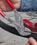 Heavy Duty Adjustable Pliers Wrench With Quick Set Button On The Fly Infinite Jaw Width And Parallel Jaws gripping bike wheel