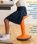 Girl using SitWell Wobble Stool With Adjustable Height For Active Seating In Classrooms And Home Learning, orange color