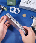 Hands holding 5 Way 7 Port Aluminum Pneumatic Manifold Air Distribution Block with G1/2 Inlet Ports and G1/4 Inch Output