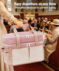 Person holding Heavy Duty Insulated Slow Cooker Carrying Bag 6 To 8 Quart Oval with top zip compartment in a church setting.