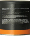 Side view of black and orange tub labeled 'Complete warning, MSDS and application information,' part of 'All In One Disc And Drum Brake Grease With Corrosion Inhibitors And Anti Wear Additives In A Reusable High Impact Tub For Wide Temperature Range And Heavy Duty Performance'.