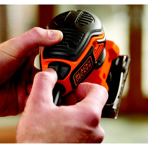 Quarter Sheet Orbital Palm Sander Professional Grade 220 Watt Motor showcasing pressure trigger switch in use.