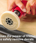 Eraser Wheel Adhesive Remover For Decals And Vinyl 4 Inch Diameter 5/8 Inch Thick on drill close-up