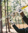 Person installing Zip Line Tensioning Kit With Beefy 2 Ton Ratchet Winch, Cable Grab For Three Sixteenths To Three Quarters Inch Cable.