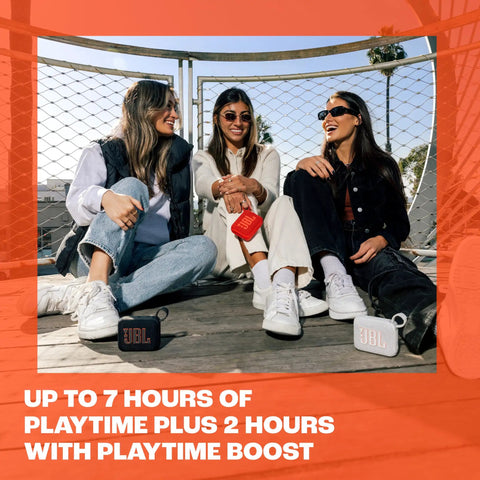 Three people sitting outside with Go 4 Ultra Portable Bluetooth Speaker That Goes Anywhere With Waterproof And Dustproof Build, Pro Sound And Punchy Bass, 7 Hour Battery, Made With Recycled Materials, Compact Blue.