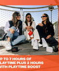 Group of three people sitting outdoors holding Go 4 Bluetooth Speaker Tiny But Mighty Ultra Portable Waterproof And Dustproof.