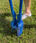 Heavy Duty Post Hole Digger With 48 Inch Steel Handle, 6.25 Inch Point Spread, Welded Tubular Steel Yokes For Digging In Hard Soil, Made In USA, Closeout Item, Limit 1 Per Order in use on grass