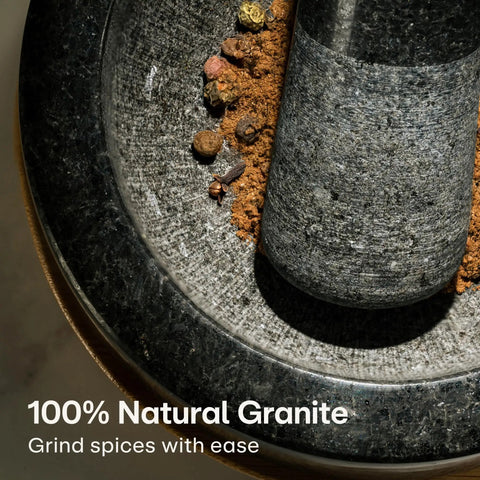 Heavy Duty 1 Cup Granite Mortar And Pestle Set For Spices And Herbs Molcajete Style Stone Grinder with spices being ground