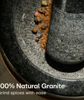 Heavy Duty Granite Mortar And Pestle Set 2 Cup Stone Grinder For Spices And Herbs With Non Slip Wooden Base in use with spices