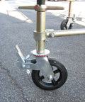 Heavy Duty 8 Inch Rubber Scaffold Caster Wheels Set Of Four Rock Solid swivel caster with dual brakes mounted on scaffold.