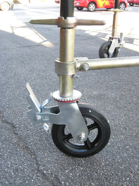 Heavy Duty 8 Inch Rubber Scaffold Caster Wheels Set Of Four Rock Solid swivel caster with dual brakes mounted on scaffold.