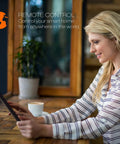 Woman using tablet to control Bluetooth Enabled Soft White Filament A19 LED Bulb For HomeKit And Siri Control, no hub needed