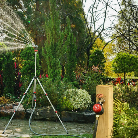 Mechanical Hose Timer For Lawn And Garden, One Zone Sprinkler Controller with tripod, watering plants in a garden