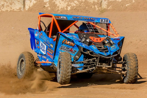 Heavy Duty Front Rack And Pinion Steering Drop In Swap For Polaris RZR 170 2009 To 2020 in action on a dirt track.