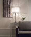 Moiselle Swanky Modern Table Lamp With Chrome Finish, Double Drum Shade In Sheer Off White, 17x17x30 Inches on a side table