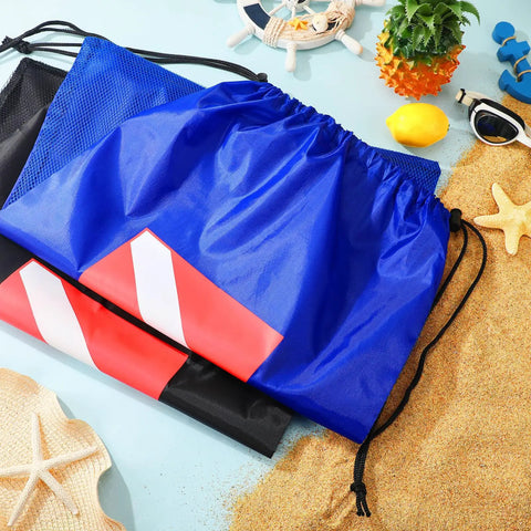 Six Pack Mesh Gear Bags for Snorkel Gear and Swim Equipment Oversized 18 by 26 Inches Nylon Drawstring Duffle Bags on sandy beach