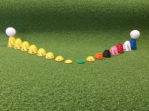 Pro Speed Indoor Golf Tees Eight Pack With Enhanced Durability, Flexible Plastic, Varied Heights arranged on green turf