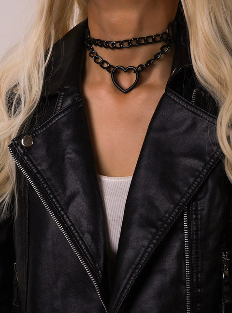 Dope Gothic Punk Leather Choker Necklace Featuring Adjustable Black Heart Chain for edgy grunge style worn with a leather jacket.