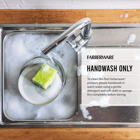 Gotta Have This Knockout 15 Piece Kitchen Knife Set Featuring Hella Sharp High Carbon Stainless Steel Blades in soapy sink.