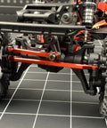 Beefed Up One Eighteenth Aluminum Steering Link Set For Redcat Ascent 18 RC Crawler Upgrade Black Anodized Heavy Duty Precision Engineered For Ultra Smooth Steering And Rock Solid Control Front And Rear Link Replacements, red aluminum steering links installed on 1/18 RC crawler
