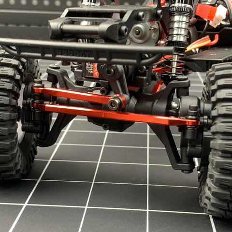 Beefed Up One Eighteenth Aluminum Steering Link Set For Redcat Ascent 18 RC Crawler Upgrade Black Anodized Heavy Duty Precision Engineered For Ultra Smooth Steering And Rock Solid Control Front And Rear Link Replacements, red aluminum steering links installed on 1/18 RC crawler