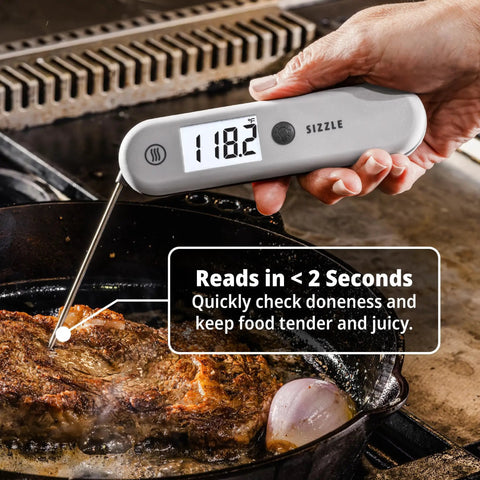 Using Sizzle Pro Grade Digital Meat Thermometer Instant Read In 2 Seconds Waterproof Folding Probe with steak on grill