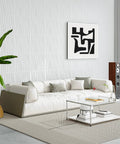 12 Pack 3D Wave Design PVC Wall Panels 19.7 By 19.7 Inch Coverage 32 Sq Ft For Interior Wall Decor In Living Room Office TV Backdrop White Modern Accent Paneling showcased in a modern living room with white sofa and abstract art.